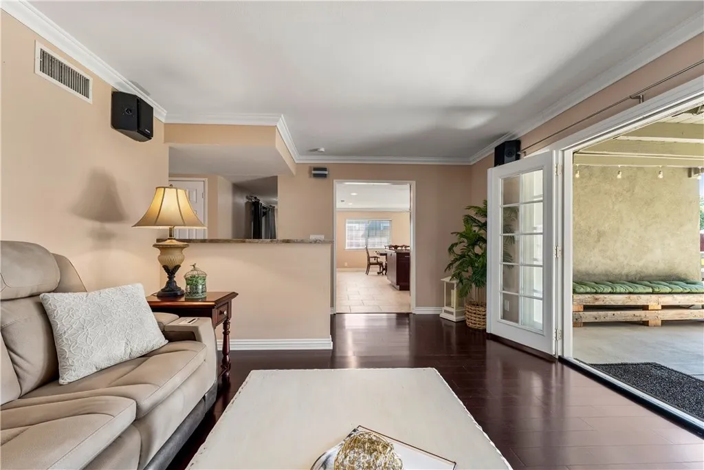 Another shot of the family room leading into the kitchen and back patio area.