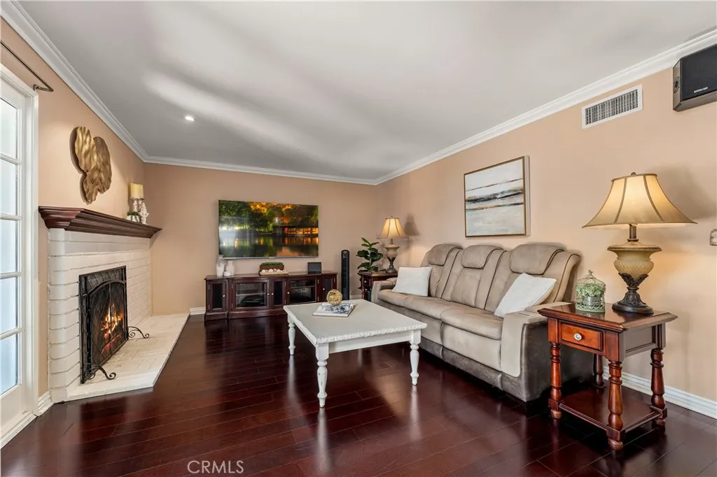 Family room with cozy fireplace.