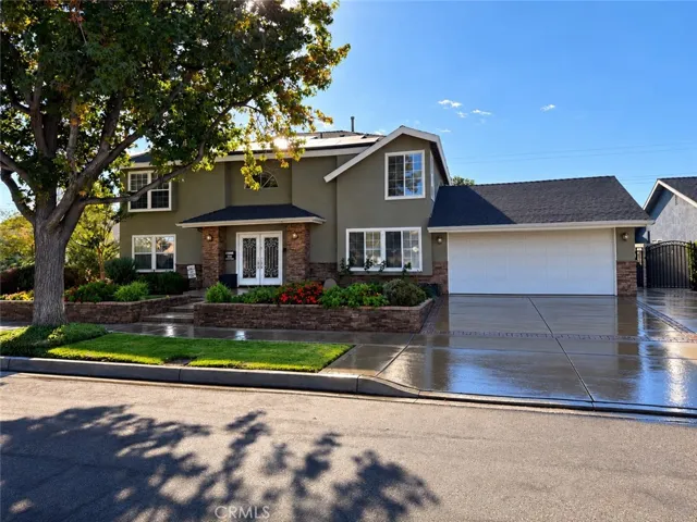 Front exterior with beautiful mature trees in a great neighborhood.