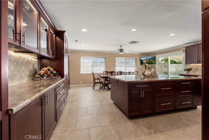 Massive kitchen island in this oversize kitchen.