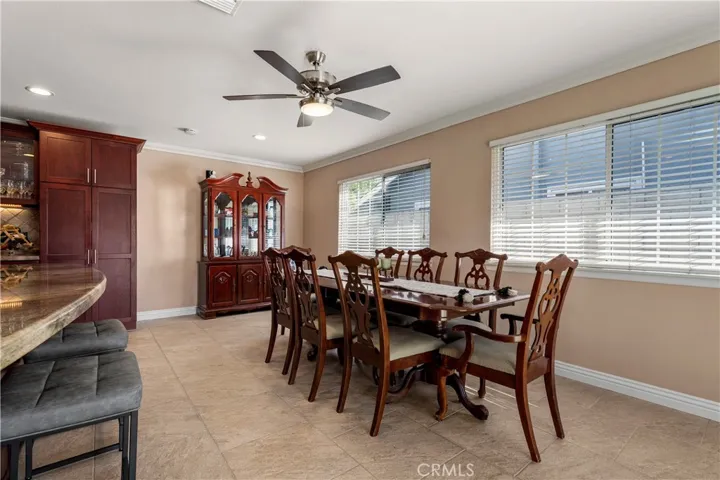 This kitchen could easily accommodate for a 12 person dining table.