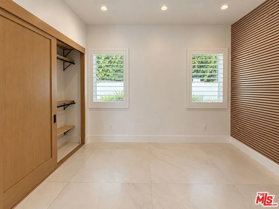 PRIMARY BEDROOM CLOSET PRIMARY BEDROOM CLOSET