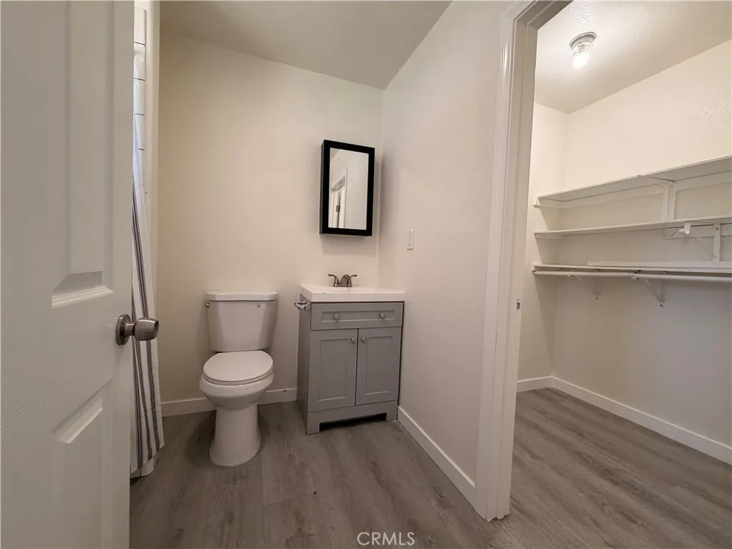 En-suite primary bathroom and walk-in closet.