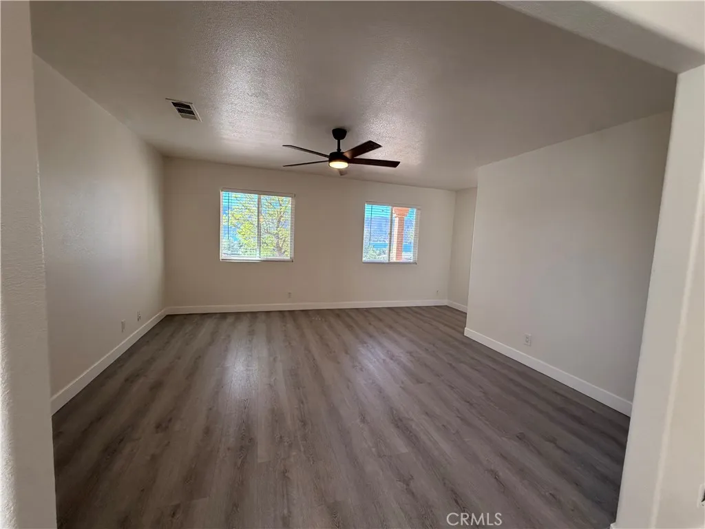 Dining area off of kitchen that opens to living room.