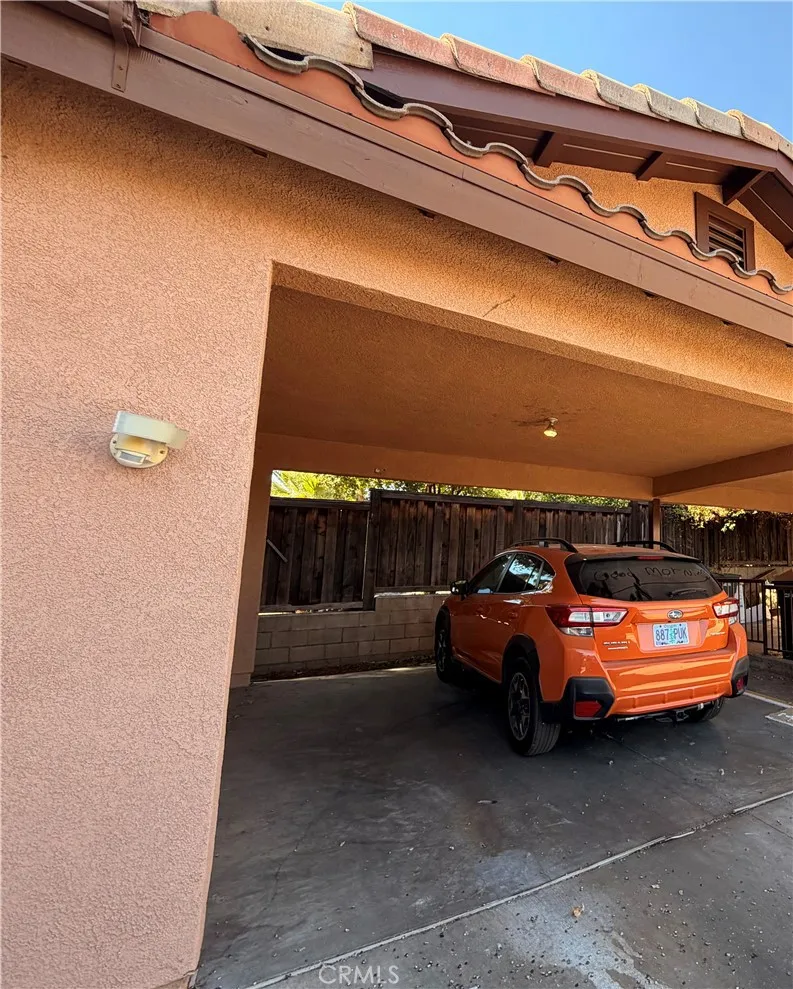 2 car carport parking adjacent to the home with direct access from the home.