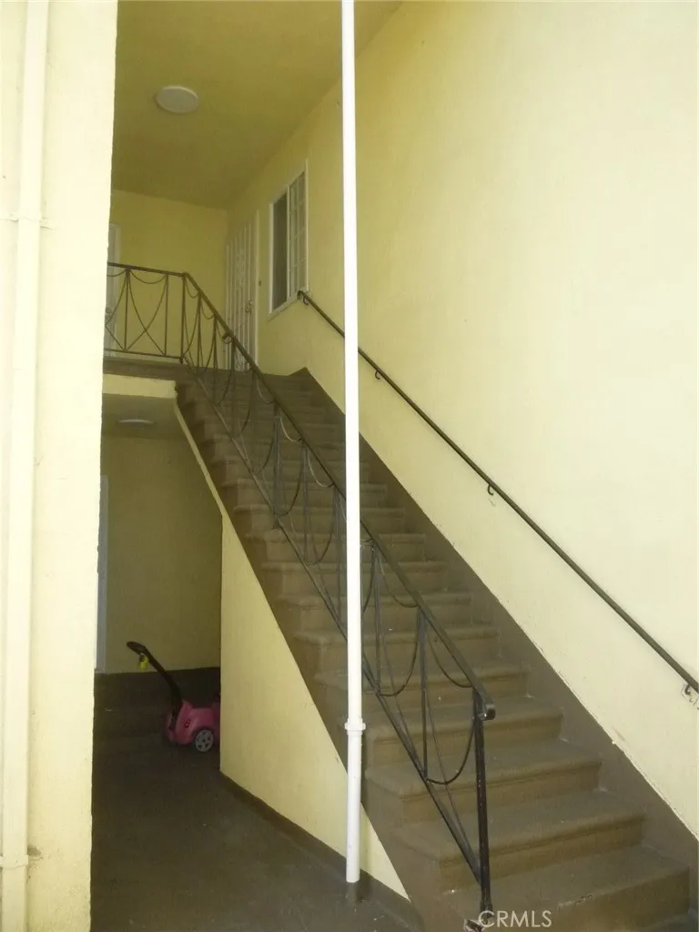 Unit #7 is upstairs to the right. Although it is labeled #7 there are only four units (1, 3, 5 and 7). Unit #7 is upstairs to the right. Although it is labeled #7 there are only four units (1, 3, 5 and 7).