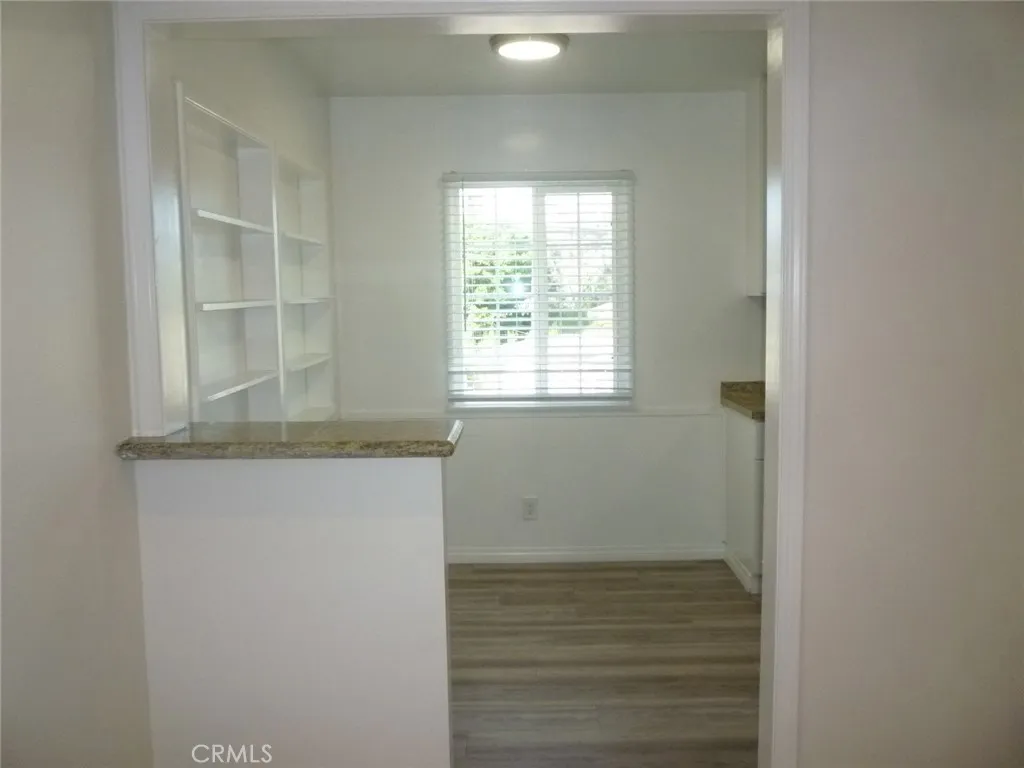 Eat in kitchen area beyond the granite counter top. Eat in kitchen area beyond the granite counter top.