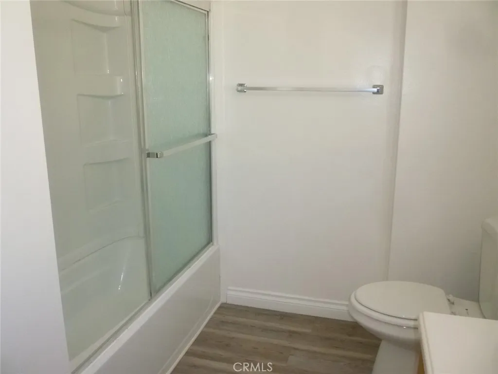 Another view of the bathroom with shower in tub. Another view of the bathroom with shower in tub.