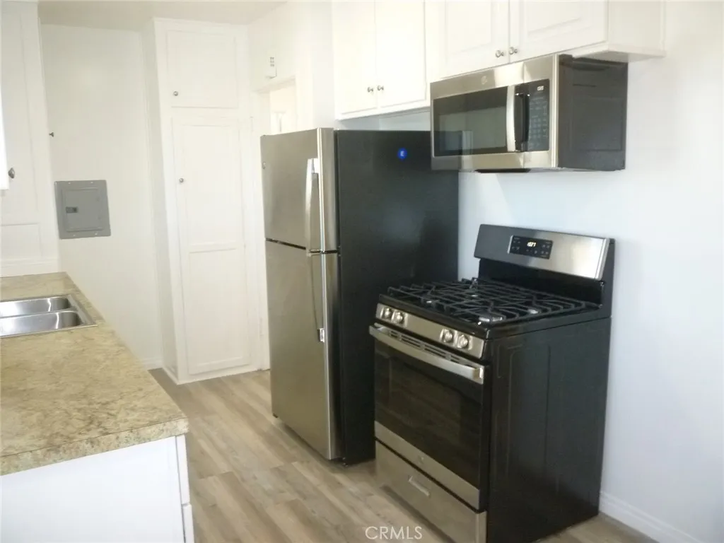 All new kitchen appliances: gas range, refrigerator and microwave oven/hood. All new kitchen appliances: gas range, refrigerator and microwave oven/hood.