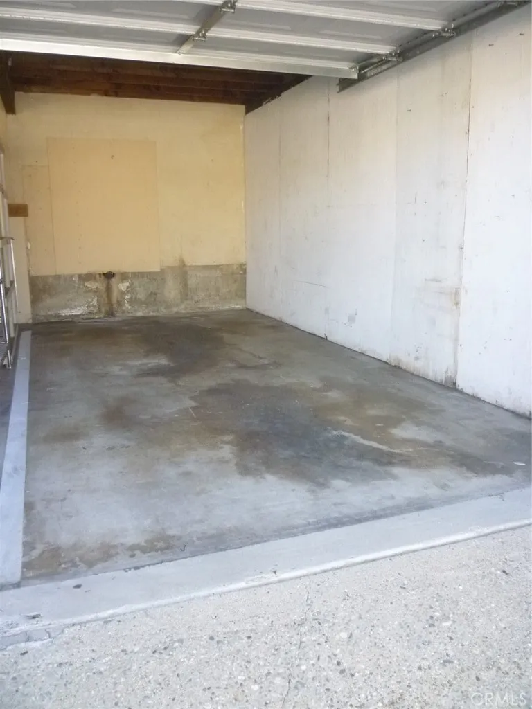 This is the half of the shared garage with automatic opener that goes along with unit #7. This is the half of the shared garage with automatic opener that goes along with unit #7.