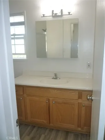 Bathroom with new medicine cabinet and light fixture.