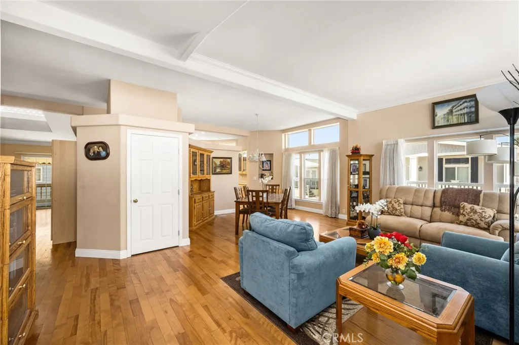 View of the Family Room & Dining Space from the Front Door. View of the Family Room & Dining Space from the Front Door.