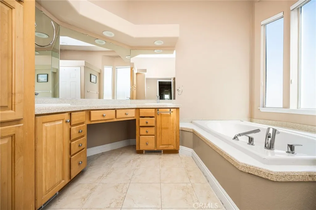 Dual Sinks with lots of Cabinetry, Separate Bathtub, and Private Toilet room. Dual Sinks with lots of Cabinetry, Separate Bathtub, and Private Toilet room.