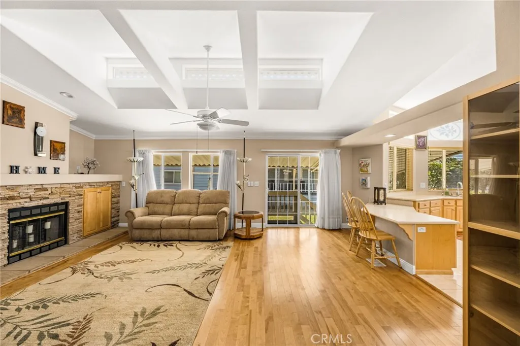 Spacious Living Room opens into Kitchen, Sliding Door leads to Covered Parking. Spacious Living Room opens into Kitchen, Sliding Door leads to Covered Parking.