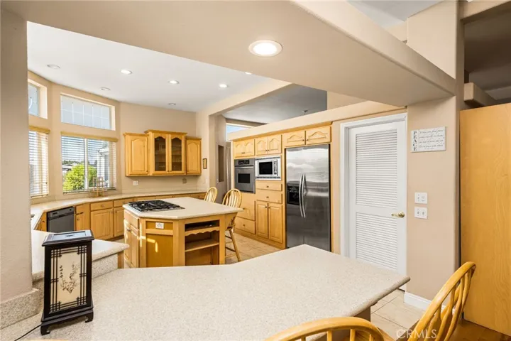 Walk-In Pantry beside the Refrigerator.