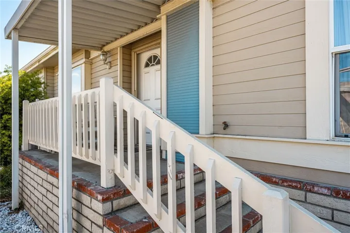 Covered Front Patio leads to Front Door.