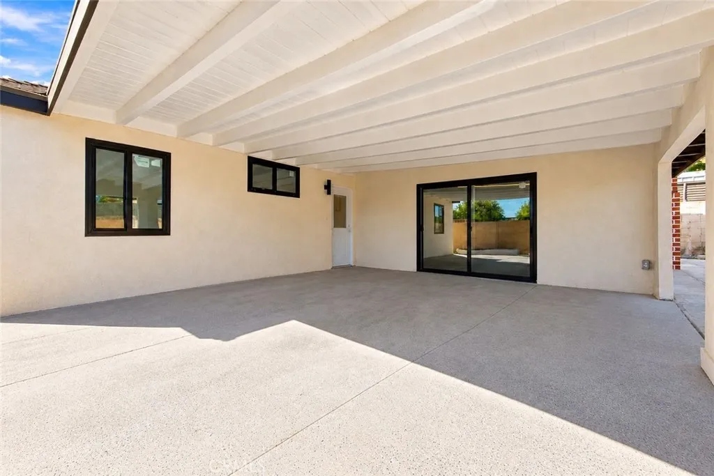 Outside, an oversized covered patio provides space for outdoor dining and gatherings while also accommodating covered parking. Two gated side-yard entrances offer additional vehicle access, and a lawn, colorful foliage, and landscaped planters enhance the backyard. A beautifully updated home with memorable architectural details and inviting spaces to enjoy inside and out! Outside, an oversized covered patio provides space for outdoor dining and gatherings while also accommodating covered parking. Two gated side-yard entrances offer additional vehicle access, and a lawn, colorful foliage, and landscaped planters enhance the backyard. A beautifully updated home with memorable architectural details and inviting spaces to enjoy inside and out!