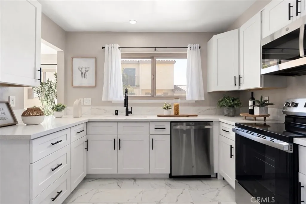 all-new crisp white cabinetry, brand new stainless steel appliances all-new crisp white cabinetry, brand new stainless steel appliances