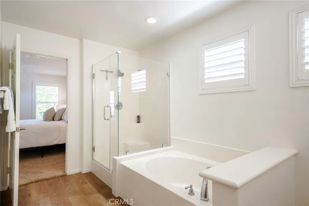 Primary Bathroom #1 En suite. Upgraded Frameless Glass Walk-in Shower and Separate Soaking Tub. Primary Bathroom #1 En suite. Upgraded Frameless Glass Walk-in Shower and Separate Soaking Tub.