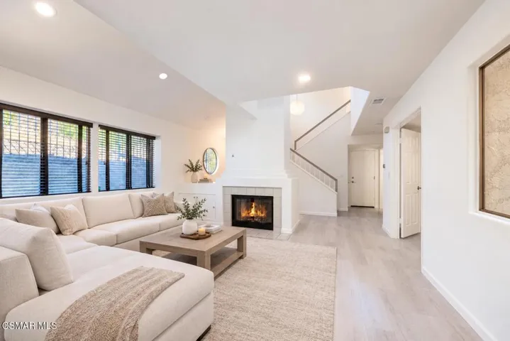 Bright Minimalist Living Room with Cozy