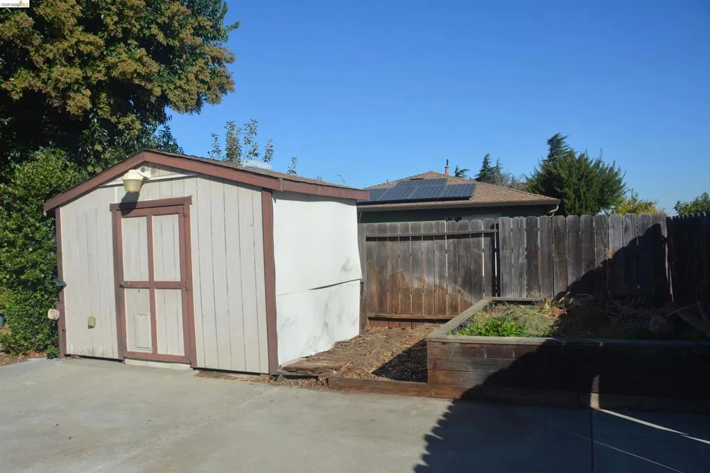 Second storage shed and raised compost bed
