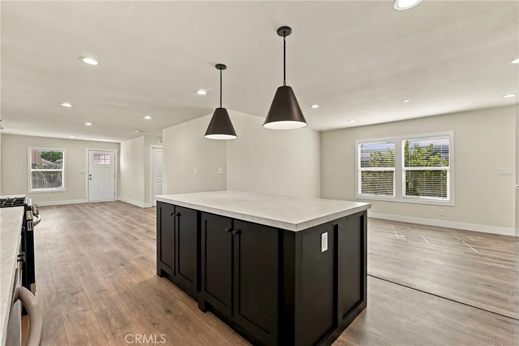 View from Kitchen into Dining Room/Living Room/Family Room