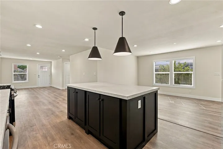 View from Kitchen into Dining Room/Living Room/Family Room