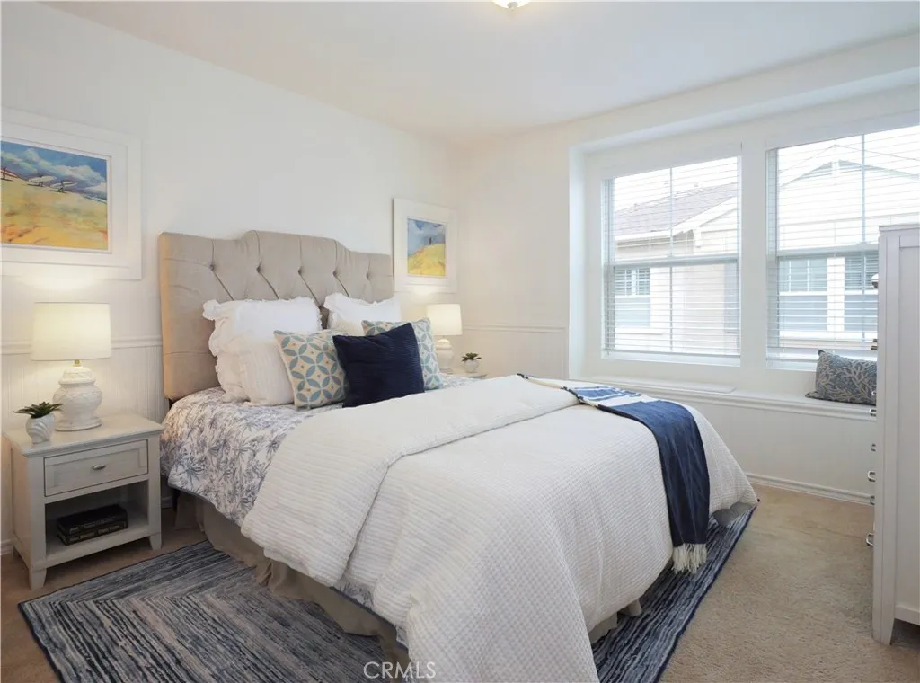 Second bedroom has elegant wainscoting panel walls Second bedroom has elegant wainscoting panel walls