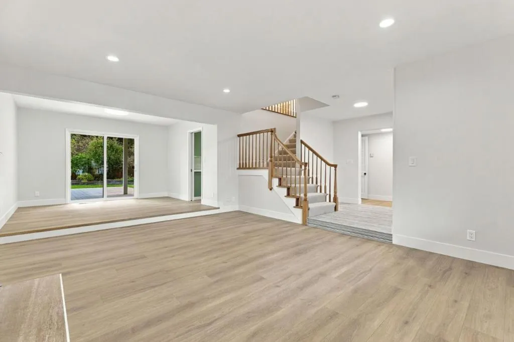 Living Room/Formal Dining Room/Foyer/Staircase