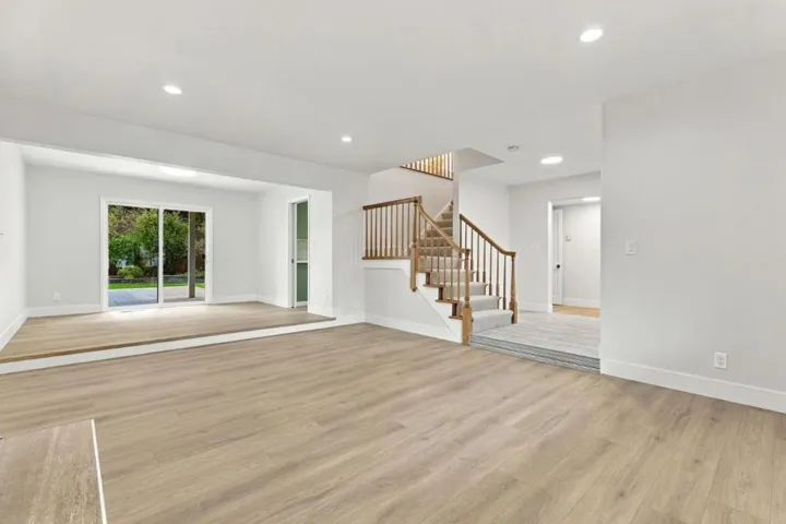 Living Room/Formal Dining Room/Foyer/Staircase