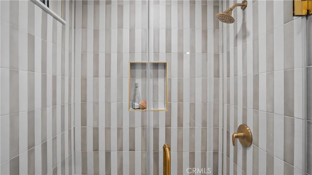 Primary Shower with Designer Tile & Brushed Gold Fixtures Primary Shower with Designer Tile & Brushed Gold Fixtures