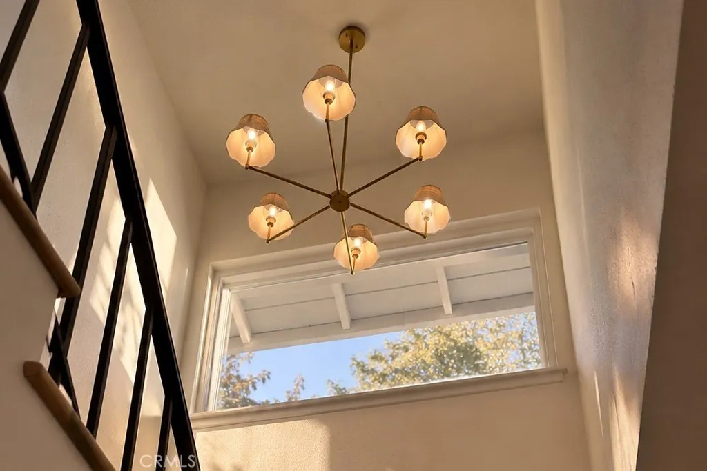 Sunlit Staircase with New Chandelier Sunlit Staircase with New Chandelier