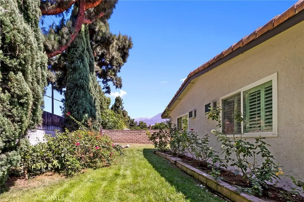Private Side Yard with Rose Garden & Mountain Views Private Side Yard with Rose Garden & Mountain Views