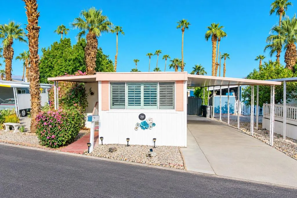 Sunlit Palm-Dotted Mobile Home Exterior