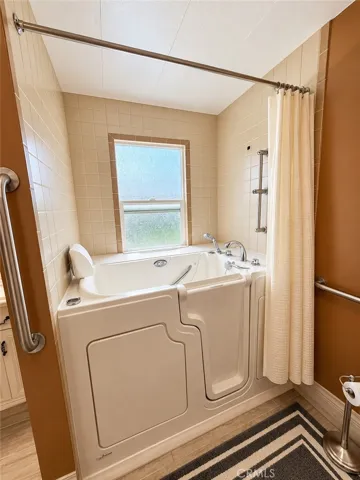 Primary bathroom walk-in tub