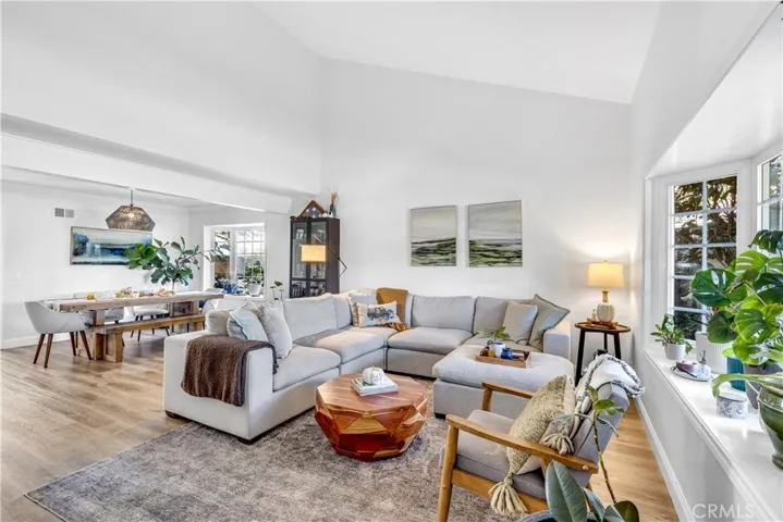Bright cheery living and dining upon entering. Vaulted ceilings and charming window seat.