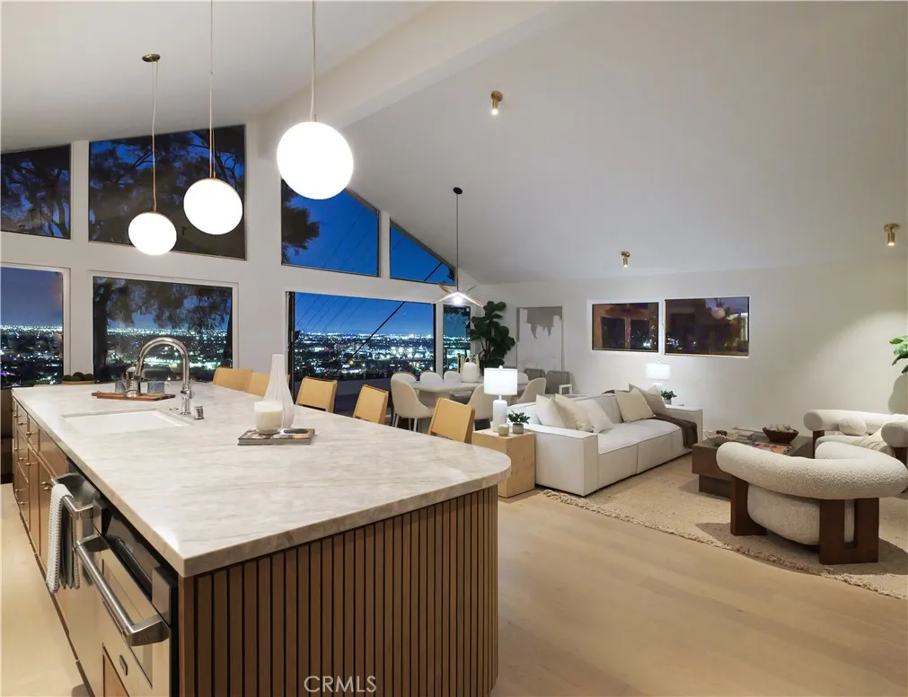 open floor plan kitchen/living room w/city lights views
