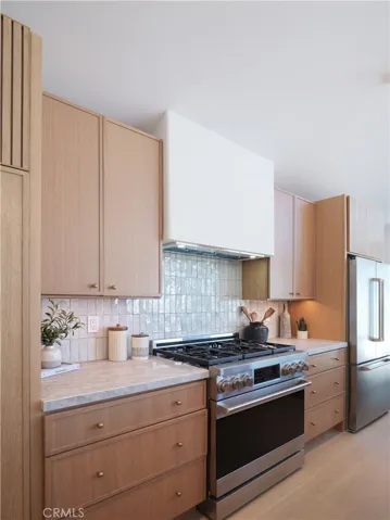 kitchen area with Thor 6 burner stove