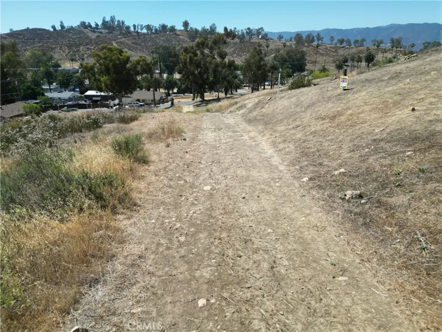 Parcel to the left of the road