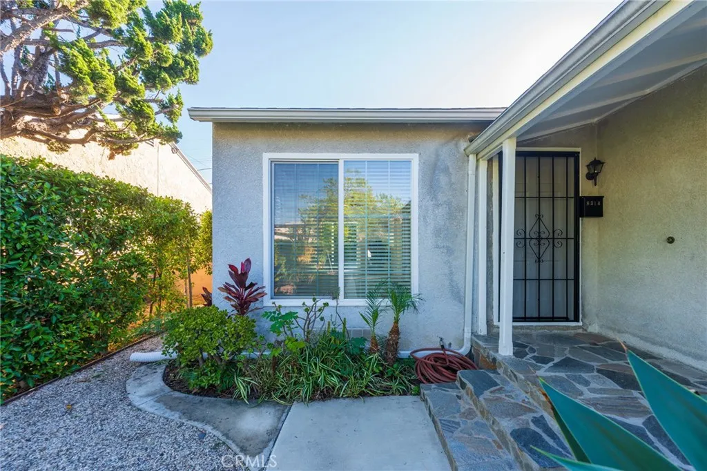 Charming Front Entry & Lush Landscaping