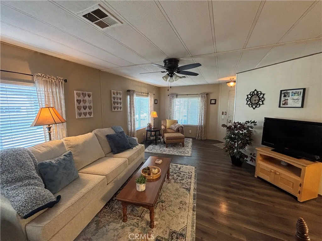 Formal Living room with newer flooring.