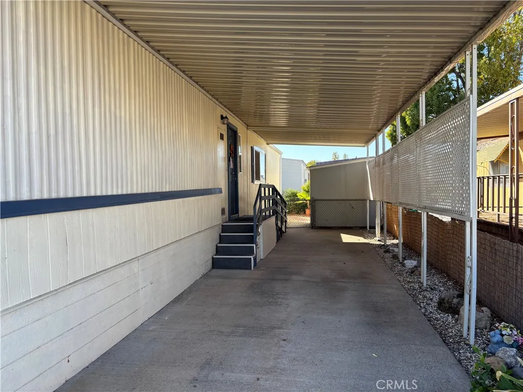 Carport and back access to home.