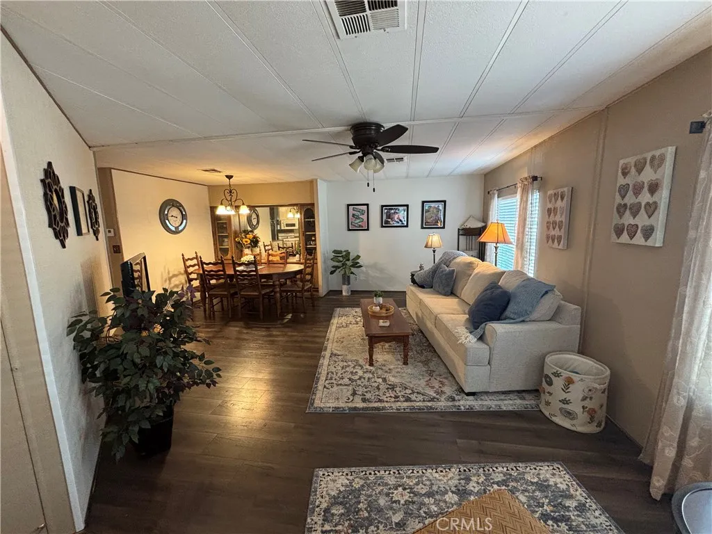 Living room flows into dining room.
