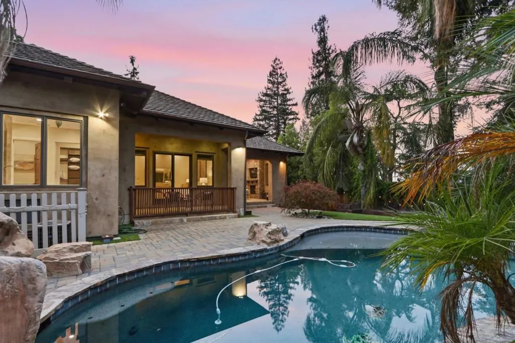 Backyard pool and covered porch at dusk, Los Gatos Backyard pool and covered porch at dusk, Los Gatos