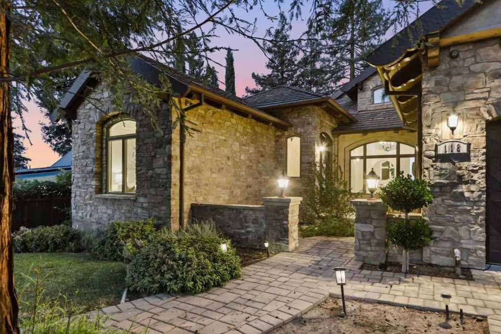 Stone entry and front windows at twilight, Los Gatos Stone entry and front windows at twilight, Los Gatos