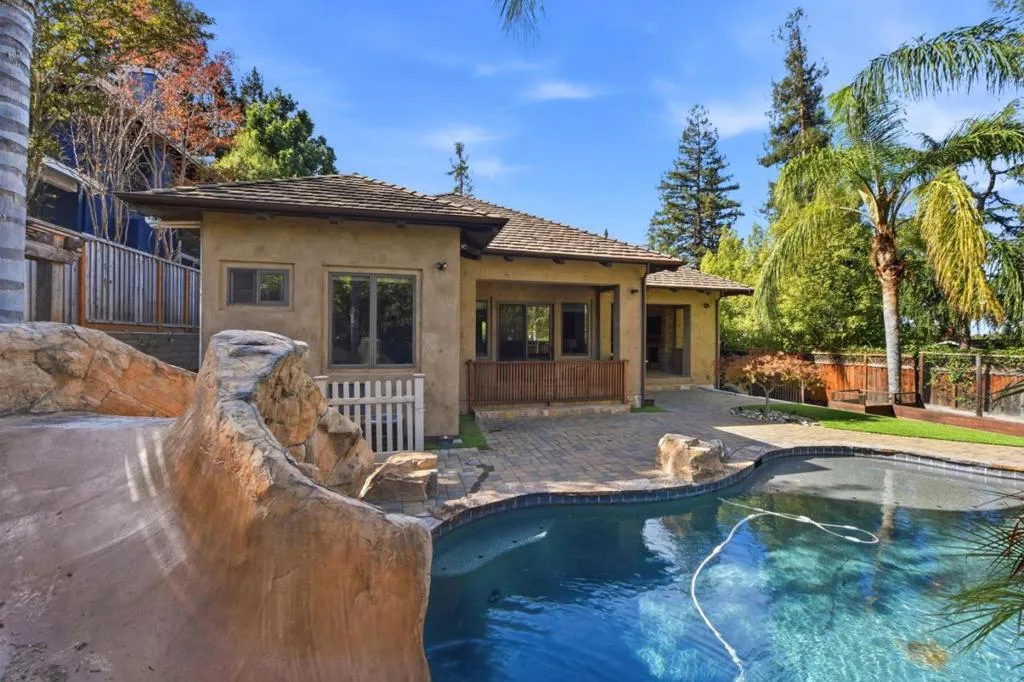 Pool with rock slide and rear of the home, Los Gatos Pool with rock slide and rear of the home, Los Gatos