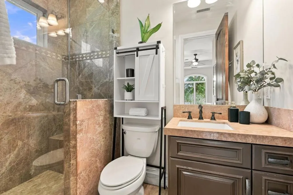 En-suite bath with glass-enclosed shower and private toilet room, Los Gatos En-suite bath with glass-enclosed shower and private toilet room, Los Gatos