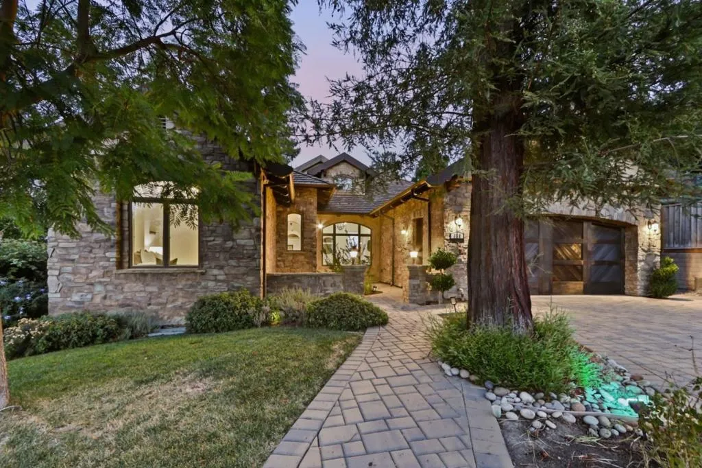 Front yard walkway and home through mature trees at dusk, Los Gatos Front yard walkway and home through mature trees at dusk, Los Gatos