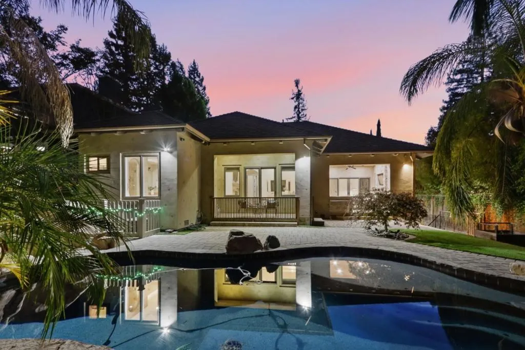 Reflecting pool and rear of the home at twilight, Los Gatos Reflecting pool and rear of the home at twilight, Los Gatos