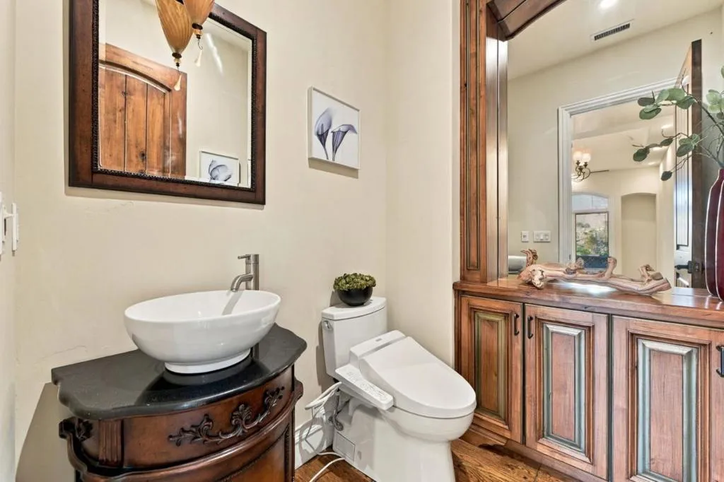 En-suite bath with vessel sink and carved wood vanity, Los Gatos En-suite bath with vessel sink and carved wood vanity, Los Gatos